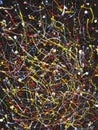 abstract art picture in jackson style pollock color splash on black background