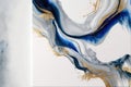 Abstract art splashing color in fluid ink texture blue and gold in background.