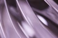Abstract art texture background of lead crystal glass surface reflecting beautiful mauve color