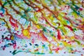 Abstract art of vivid bright colorful watercolor splash and drops on the white paper Royalty Free Stock Photo