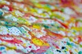 Abstract art of vivid bright colorful watercolor splash and drops on the white paper Royalty Free Stock Photo