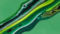 Abstract artwork featuring flowing layers of various green shades, including lime, emerald, and forest green, accented with dark,