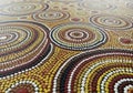 Abstract artwork featuring intricate circular patterns in an Aboriginal dot Royalty Free Stock Photo