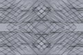 Abstract asymmetric background of the wooden planks. Abstract minimalistic pattern intersecting strips. Grey background.