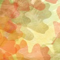 Abstract autumn background with grunge elements. Large realistic prints of oak leaves, yellow-brown, orange and green.
