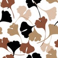 Abstract autumn foliage seamless pattern with ginkgo biloba leaf silhouettes in earth tone colors Royalty Free Stock Photo