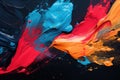 Abstract background of acrylic paint in red, orange and blue colors. A background with strokes of wild paint, sporadically set on