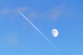Abstract Background With Aircraft Condensation Trail And Moon