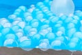 Abstract background with balloons in a pool