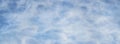 Abstract background based on clouds of uncertain shape in light blue sky_ Royalty Free Stock Photo