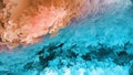 Abstract background, blue and orange layers of flakes, sky and earth, imitation of mountains or cave, warm-cold, natural