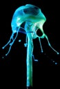 abstract background, blue paint jellyfish fountain, splash of colourful water, liquid art Royalty Free Stock Photo