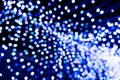 Abstract Background of Blue and White Bokeh from De-focused Festive String Lights Royalty Free Stock Photo