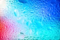 Abstract background. Abstract blur image of colored soft spots of gradients and glare through wet glass. Texture of water drops on Royalty Free Stock Photo