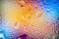 Abstract background. Abstract blur image of colored soft spots and gradients through wet glass. Texture of water drops on glass. Royalty Free Stock Photo