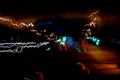 Abstract background blurred colored marks from fast moving cars night Royalty Free Stock Photo