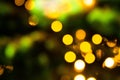 Abstract background with blurred golden lights. Glowing effect. Gold bokeh of light textured glitter background. Christmas party ,