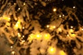 Abstract background with blurred golden lights. Glowing effect. Gold bokeh of light textured glitter background. Christmas party , Royalty Free Stock Photo