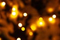 Abstract background with blurred golden lights. Glowing effect. Gold bokeh of light textured glitter background. Christmas party , Royalty Free Stock Photo