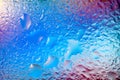 Abstract background. Abstract blurred image of colored soft spots and gradients through transparent wet glass. The texture of Royalty Free Stock Photo