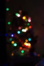 Abstract background with blurred multicolored lights garlands on a black background Royalty Free Stock Photo