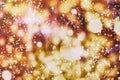 Abstract light celebration background with defocused golden lights for Christmas, New Year, Holiday, party Royalty Free Stock Photo