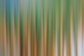 Abstract background with blurry stripes shape in vertical lines. Light green and yellow smooth colors background in digital motion Royalty Free Stock Photo