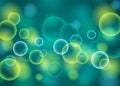 Abstract background with a bokeh of dark green and blue lights. Royalty Free Stock Photo