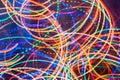 Abstract background. Bright glowing multicolored spiral twisted lines. Royalty Free Stock Photo