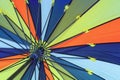 Abstract background of a bright multi-colored umbrella on the inside with spokes Royalty Free Stock Photo