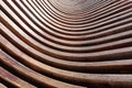 Abstract background of brown wooden curves. Smooth bends Royalty Free Stock Photo