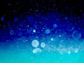 Abstract background with bubble bokeh in blue color