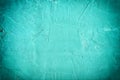 Abstract background bumpy putty. Beautiful turquoise color, empty space with vignette. Royalty Free Stock Photo