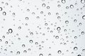 Abstract background of clear droplets of rain on car window Royalty Free Stock Photo