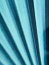 Turquoise louvers radiating out in the shape of rays Royalty Free Stock Photo