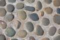 Abstract background of cobblestone pavement close-up. Top view on stone road close up. High resolution photo. Mock up Royalty Free Stock Photo