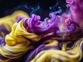 Abstract background of colored ink in water on a black background close up