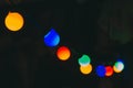 Abstract background. Colored lights on the street, Christmas garland. texture in defocus. Night Royalty Free Stock Photo