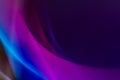 Abstract background with colored lines and blur effect of purple and blue colors. Gradients, waves and twisting