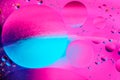 Abstract background with colorful gradient colors. Oil drops in water abstract psychedelic pattern image. Pastel pink and blue col