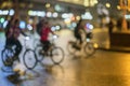 Abstract background of colorful group of bicyclists, night city street, blur effect, unrecognizable faces. Sport Royalty Free Stock Photo