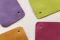 Abstract background of colorful multicolored leather samples on white leather, top view, copy space Royalty Free Stock Photo