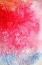 Abstract background of colorful watercolor stains and blurry colors of orange red and blue. Bright red flower or burst on blue Royalty Free Stock Photo