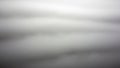 Soft focus abstract background of flowing grey and white cloud-like textures blurred Royalty Free Stock Photo