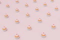 an abstract background consisting of patterns of beautiful cakes with cream on a pastel background. 3D render