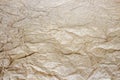 Abstract background. Crumpled paper texture. Craft paper artistically crumpled. P