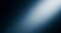 Dark blue and white abstract background with a bright diagonal light beam and subtle grain texture Royalty Free Stock Photo