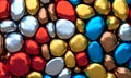 Abstract background of deformed metallic balls in different colors