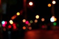 Blurred bokeh background, multicolored lights on dark, night, ci Royalty Free Stock Photo