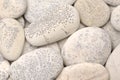 abstract background with dry round gray reeble stones gray close-up pebbles background spa relaxation concept Royalty Free Stock Photo